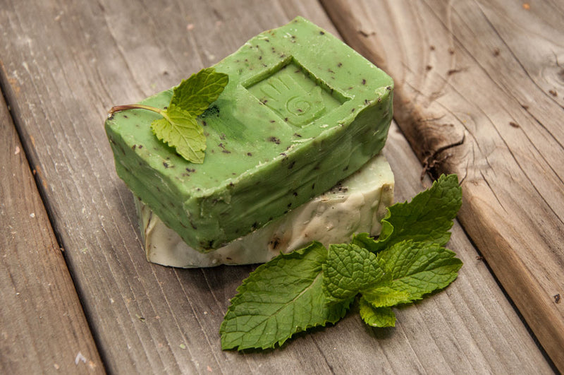 Green peppermint soap with fresh mint leaves